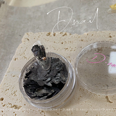 D. Nail dried flower shell black