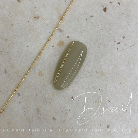 D. Nail dot chain gold